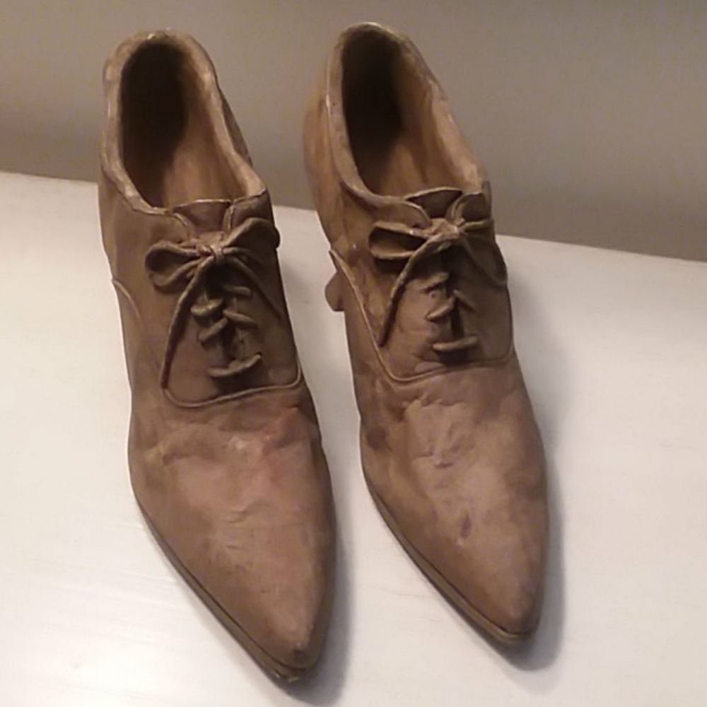 Adorable life-like pair of shoe planters